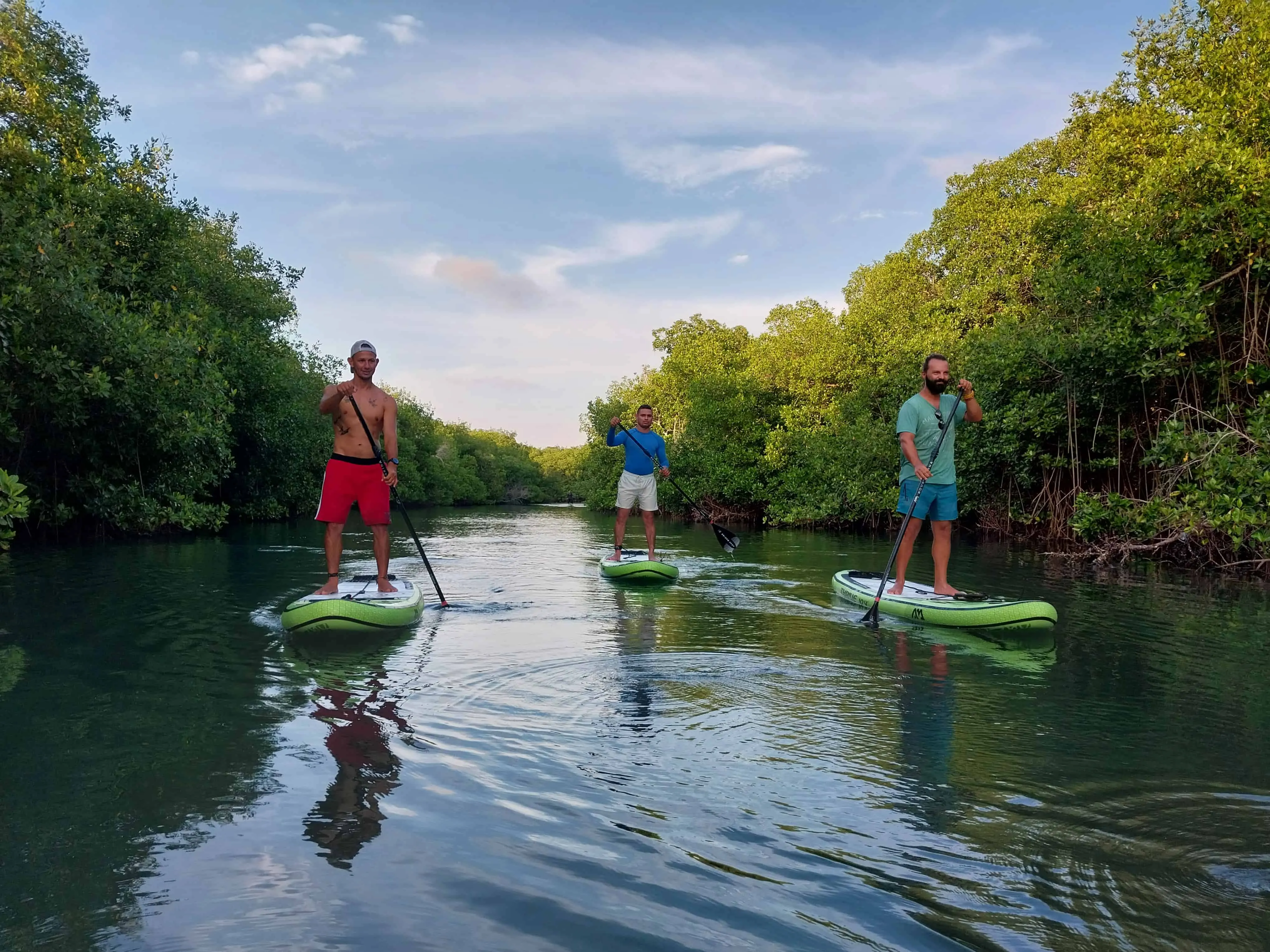 child learning paddleboard